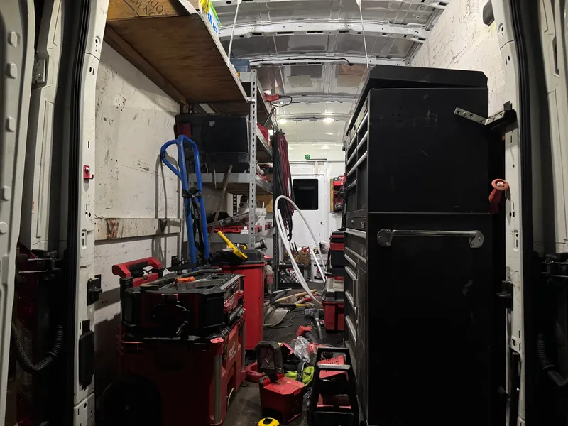 Professional service van interior stocked with tools for Northern Utah home maintenance and repair