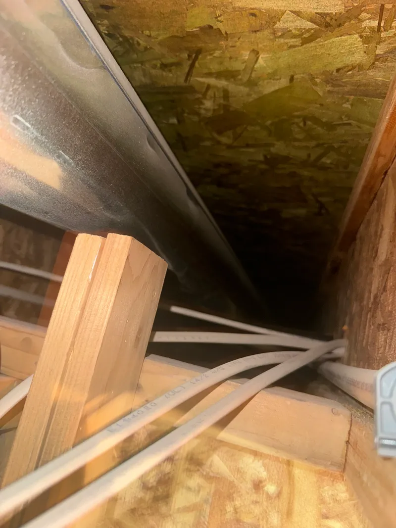 Sheet metal ductwork installation in attic