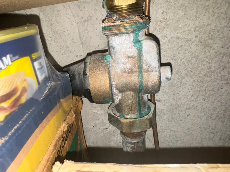 Corroded T&P relief valve requiring replacement