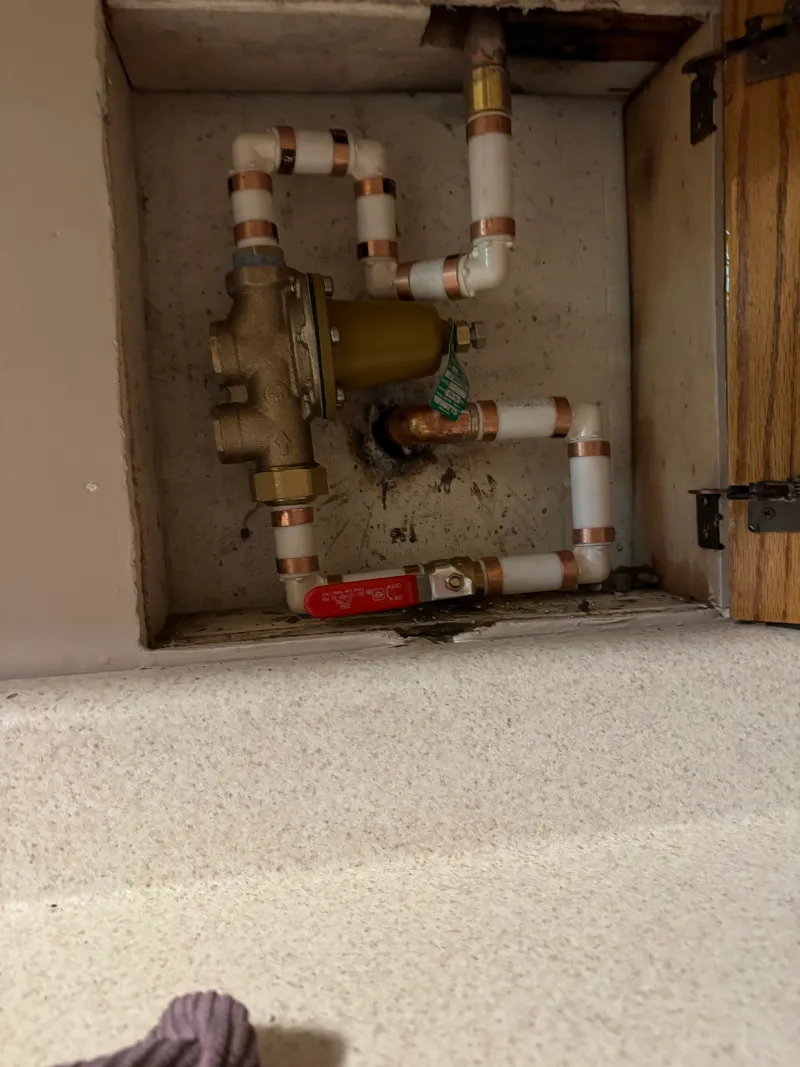 PEX shut-off valves and PRV installation in wall cavity