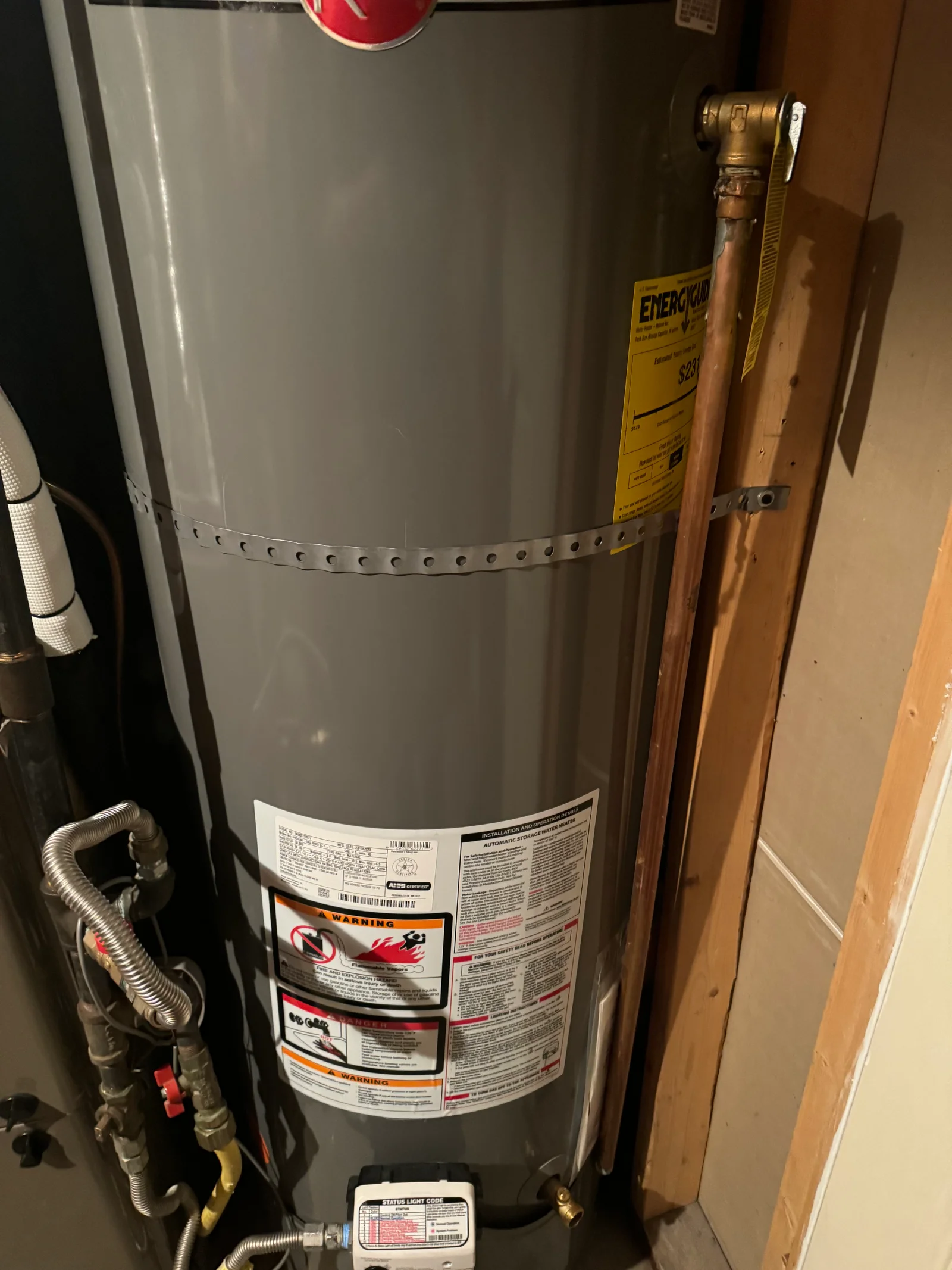 Newly installed and properly strapped water heater in a Utah home, secured for earthquake safety